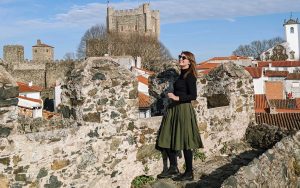 Daniela standing on the castle wall in Bragança on a sunny February day