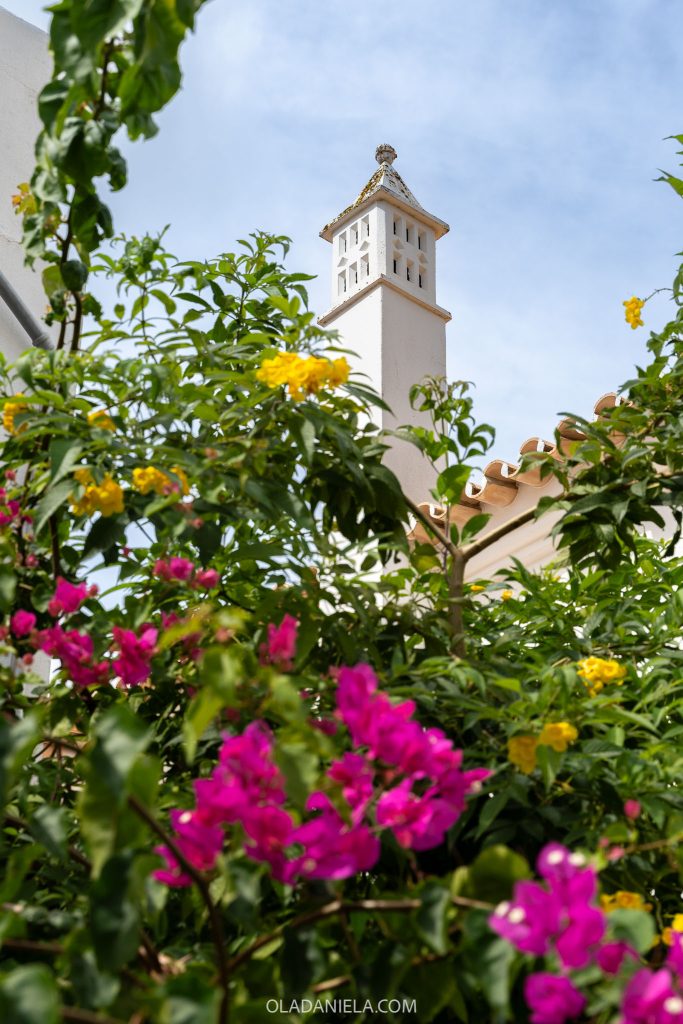 Algarve traditional chimney and bougainvillea