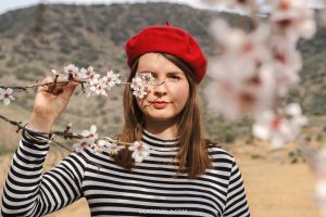 Daniela in the Douro Superior region in Portugal with almond blossoms