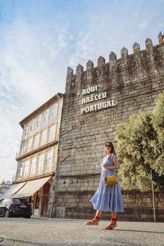 Taking a photo with this old castle wall is one Thing to do in Guimarães