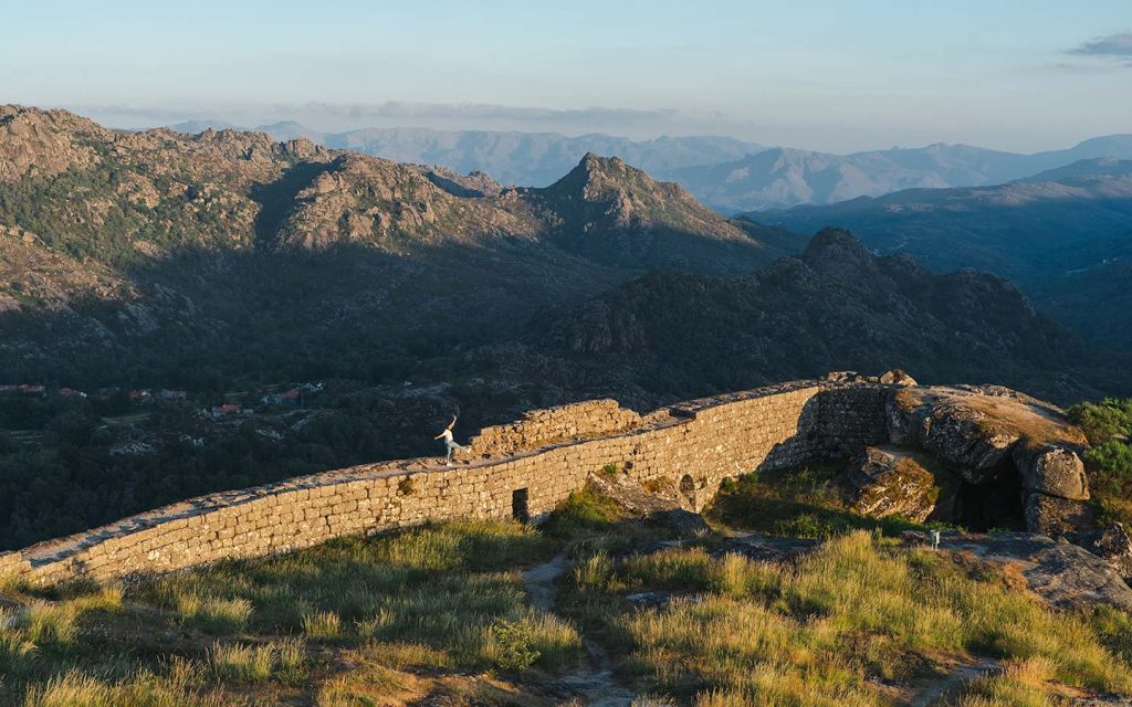 Dancing atop the Castro Laboreiro Castle as the sun sets