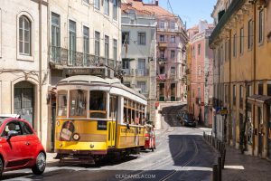 A yellow tram trundling through São Bento neighbourhood