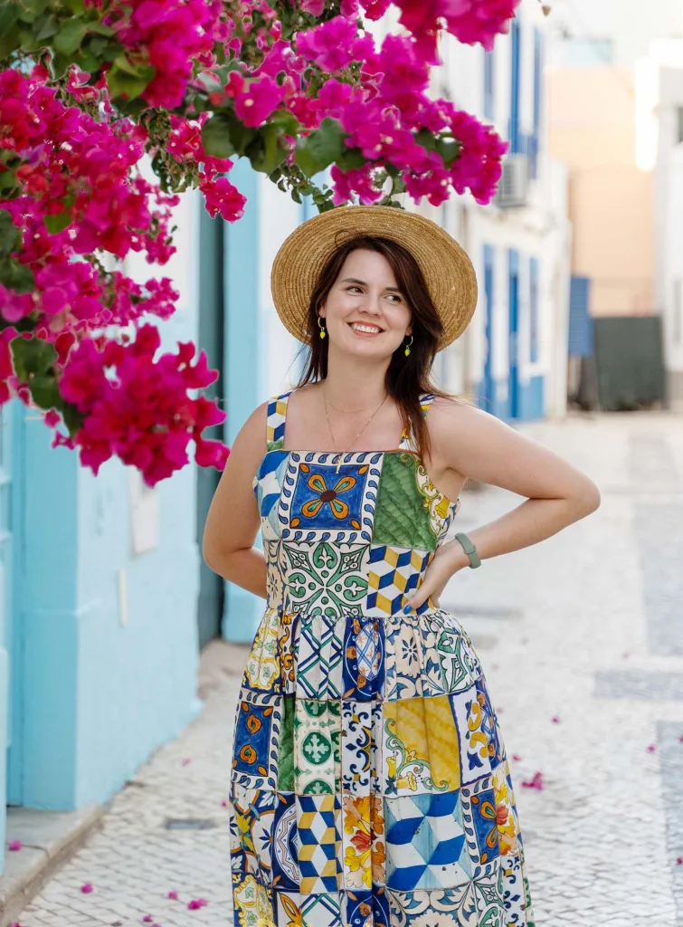 Daniela Sunde-Brown in a tiled dress with a straw hat on